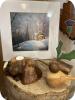 Local crafted goods, including a print, a candle holder, a Christmas ornament and a wooden bird © Lorna Radbourne